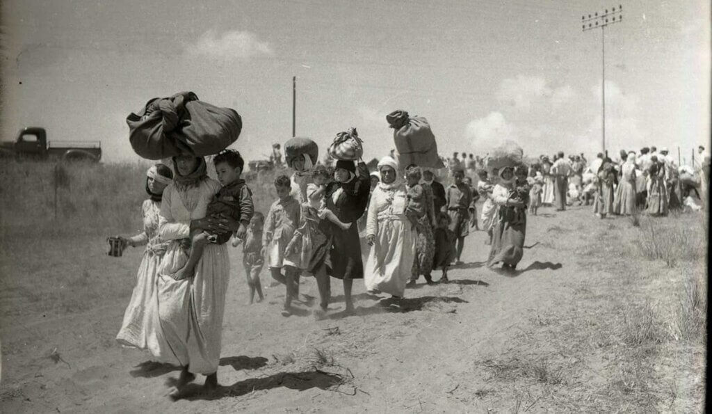 Tantura residents flee their village, May 1948. (Photo Credit: Benno Rothenberg / Meitar Collection, Pritzker Family National Photography Collection, National Library of Israel)