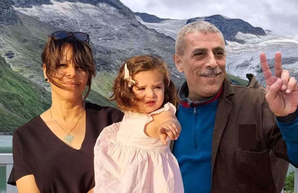 A collage photo of Walid Daqqah giving the victory sign juxtaposed next to an image of his wife, Sana', and their daughter Milad, with rolling mountains in the background.