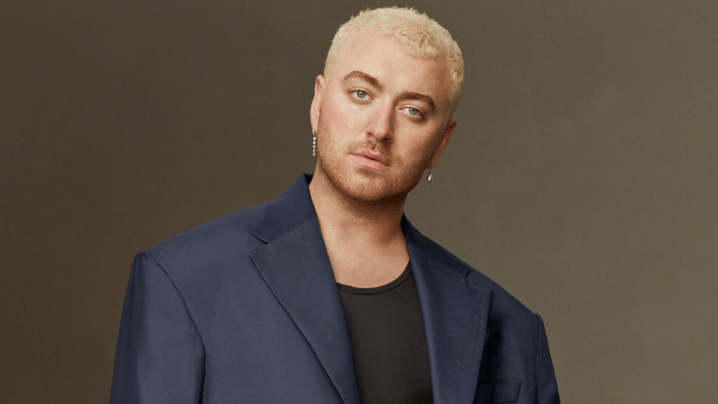 The singer Sam Smith standing in a promotional photo.