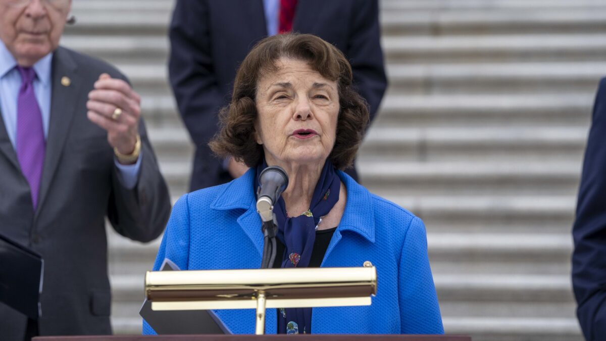 89-year-old woman speaks at podium on Capitol steps