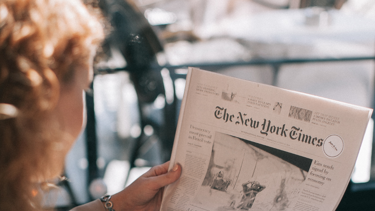 Woman reading the New York Times